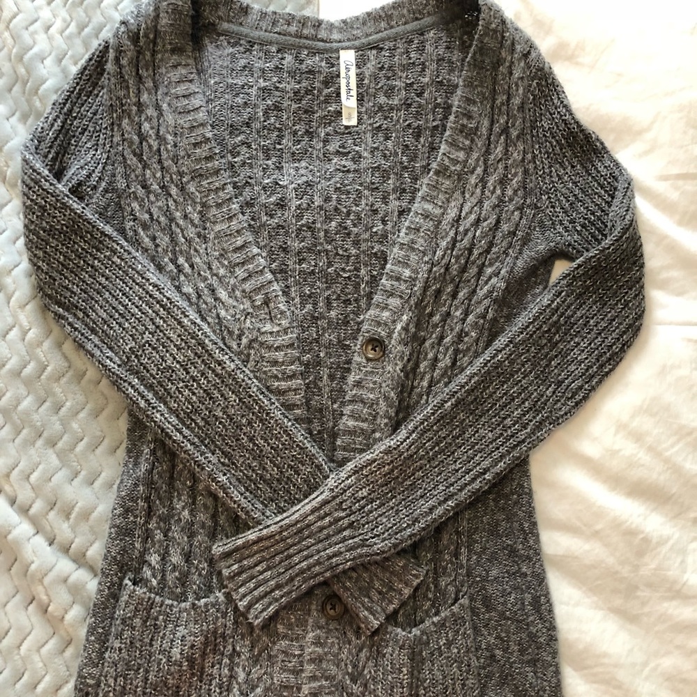 Grey cardigan.